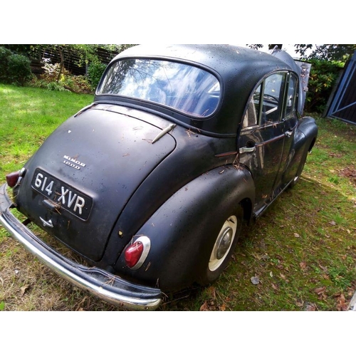 63 - A 1960 Morris Minor four door saloon, registration no. 614 XER, 13/04/60. 948cc, black.   An extreme... 