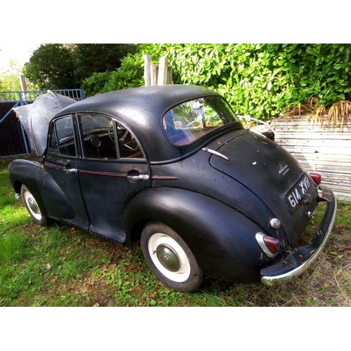 63 - A 1960 Morris Minor four door saloon, registration no. 614 XER, 13/04/60. 948cc, black.   An extreme... 