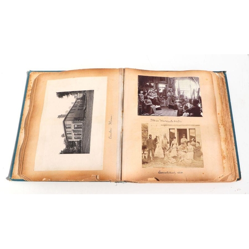 78 - A late Victorian photograph album to include photos of Kingston Upon Thames, a New Zealand, Maori fa... 