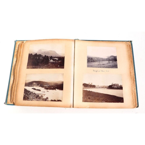 78 - A late Victorian photograph album to include photos of Kingston Upon Thames, a New Zealand, Maori fa... 