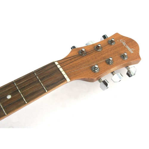 84 - A Gremlin 6-string acoustic guitar, model no. GR2917.