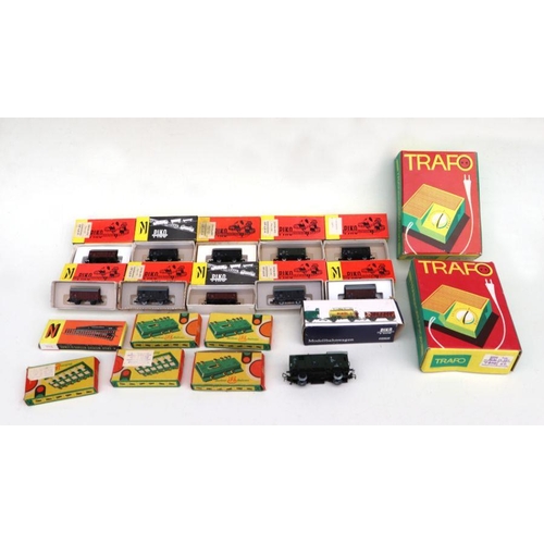 89 - A large quantity of Piko N gauge and HO gauge locomotives, carriages, buildings, track and accessori... 