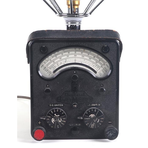125 - A vintage Universal Ivo Meter converted to a table lamp, 44cms high.