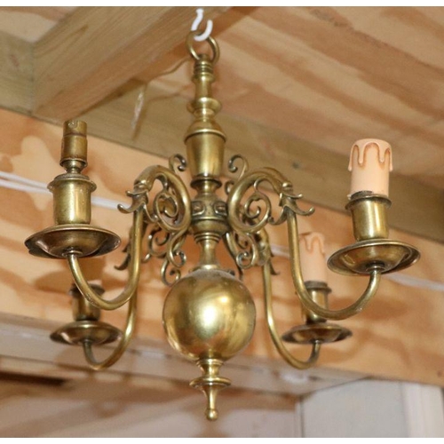 129 - A Hinkley Lighting brass Dutch style four-arm ceiling light, approx 35cms wide.