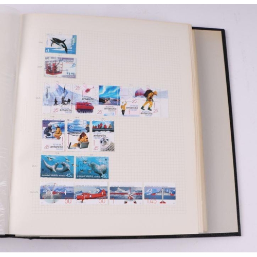 41 - Four albums containing assorted World stamps to include Singapore, South Africa, Jamaica, Australia ... 