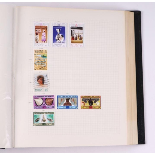 41 - Four albums containing assorted World stamps to include Singapore, South Africa, Jamaica, Australia ... 