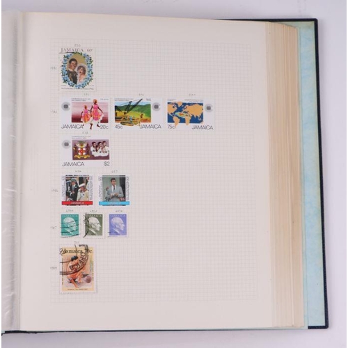 41 - Four albums containing assorted World stamps to include Singapore, South Africa, Jamaica, Australia ... 