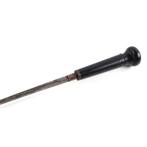 48 - A late 19th century French ebonised sword stick with short stiletto blade, 83cms long.