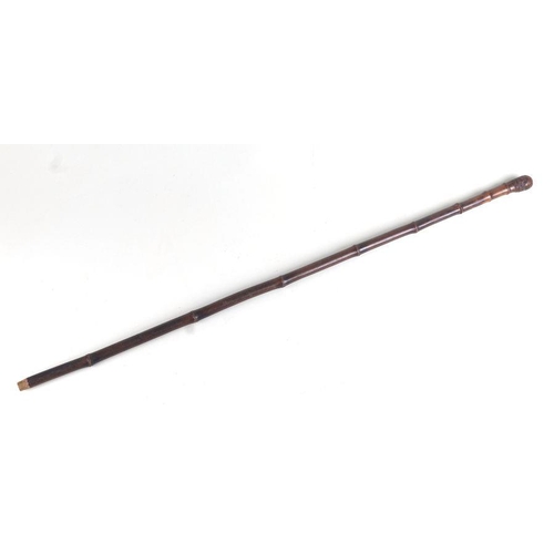 50 - A bamboo sword stick with square tapering steel blade, overall 90cms, blade length 28cms.