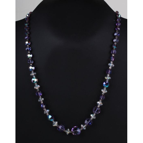 501 - A vintage faceted graduated glass bead necklace with silver clasp.