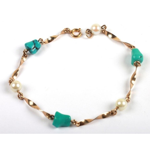 530 - A 9ct gold turquoise and seed pearl bracelet, 4g.