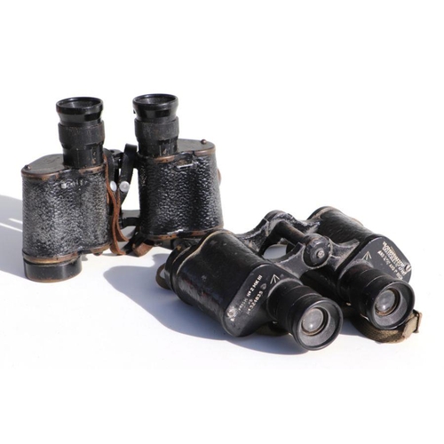 63 - A pair of WW2 British Taylor-Hobson No.2 MK III military marked binoculars dated 1943 with their lea... 