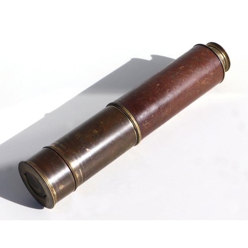 65 - A 19th century three draw brass and leather Naval telescope with sliding shutters at each end. Its e... 