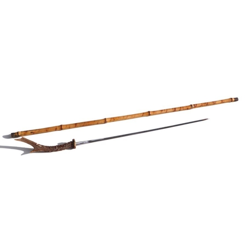 69 - A cane shafted sword stick with a 48cms (19ins) square section blade and a stag horn handle. Makers ... 