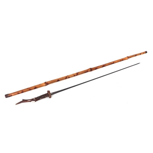 72 - A bamboo shafted sword stick with a 56.5cms (22.25ins) square section blade and a stag horn handle. ... 