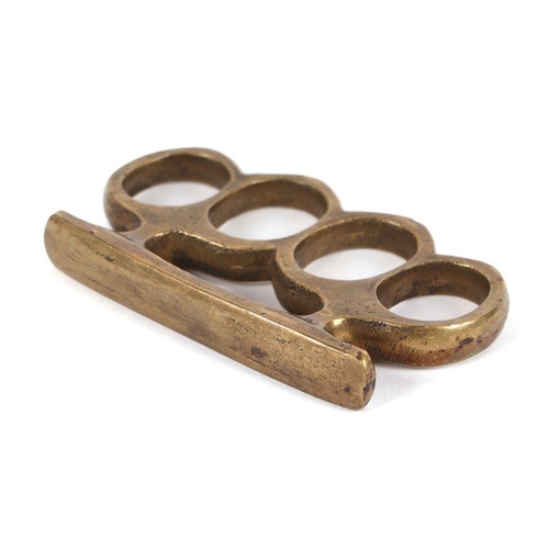 79 - A military type cast brass knuckle duster.