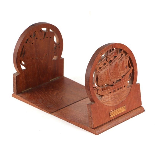 101 - A pair of bookends carved from teak taken from HMS Iron Duke, the flagship of Admiral Jellicoe, one ... 