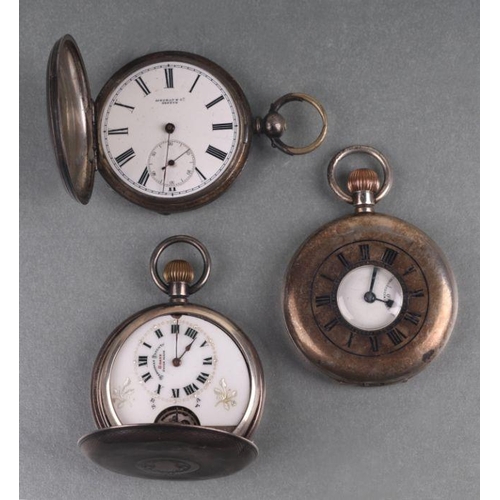 1043 - Two silver cased full hunter pocket watches; together with a silver cased half hunter pocket watch (... 