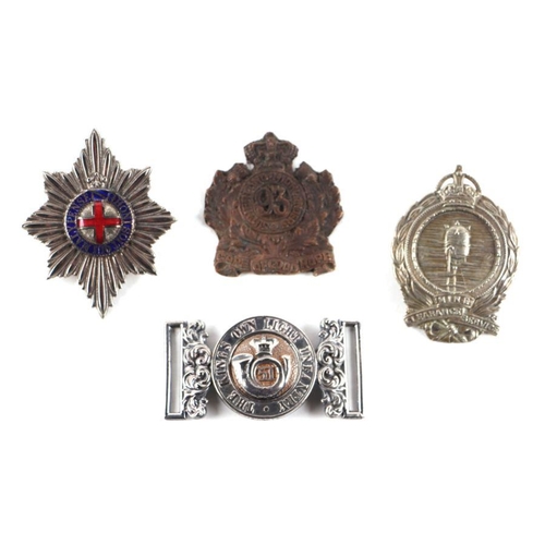 1502 - The Kings Own Light Infantry belt buckle; together with a Sutherland Highlanders belt buckle; and tw... 