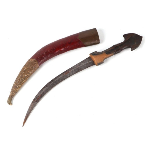 1505 - A Middle Eastern curved dagger with horn handle, in a brass mounted leather scabbard, 43cms long.