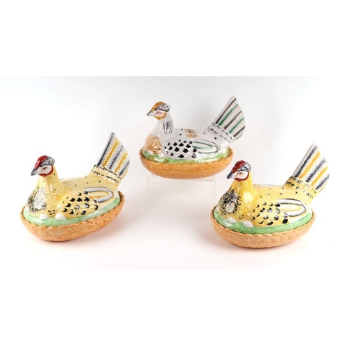 153 - Three Staffordshire pottery style hens on nests, each approx 30cms long (3).