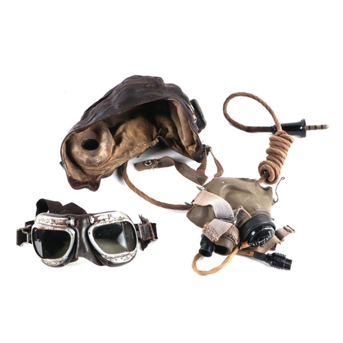 1531 - A WWII RAF C type leather flying helmet, intercom and goggles.