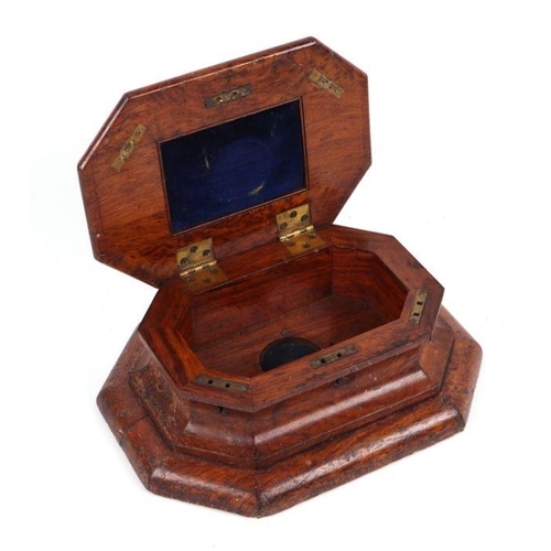 198 - A 19th century oak seal box of octagonal form, the cover inset with a brass plaque 'A.V.I. Co. Seal,... 