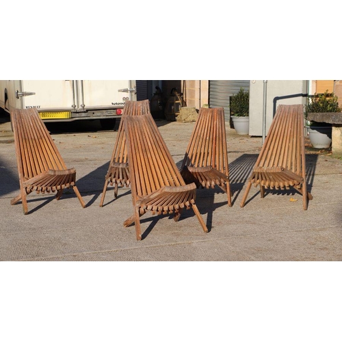 2 - A set of five pine folding chairs.