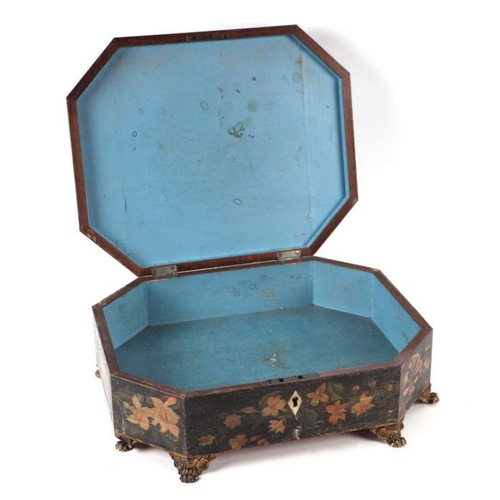 200 - A 19th century painted work box of elongated octagonal form decorated with flowers, on pressed brass... 