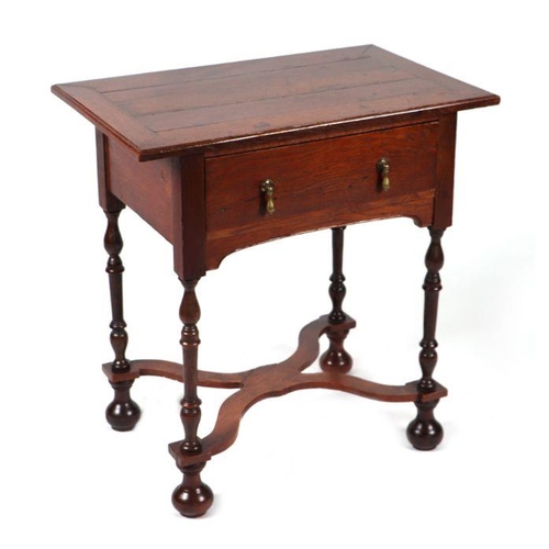 2186 - A Victorian 17th century style oak lowboy with single frieze drawer, on turned supports joined by an... 