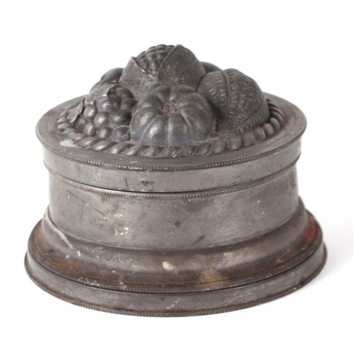 219 - A Victorian pewter ice cream or blancmange mould, No. 1, with registration lozenge mark, 17cms diame... 