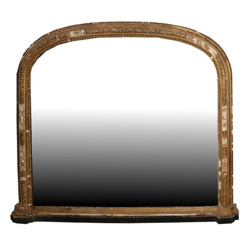 2190 - A large Victorian arch topped giltwood and gesso overmantle mirror with original ceramic bun feet an... 