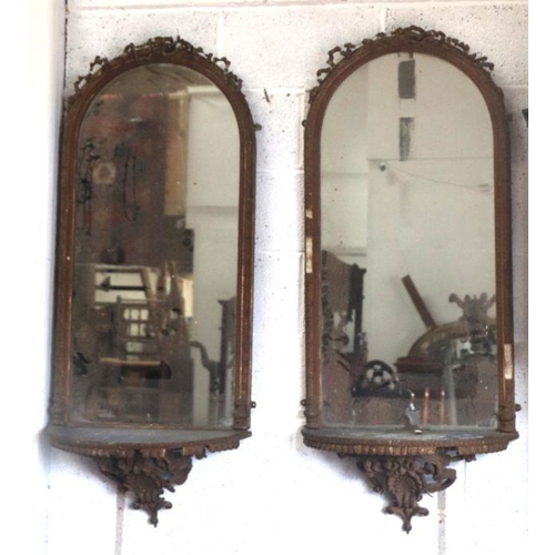 2192 - A pair of Victorian giltwood and gesso Pier mirrors with ribbon decoration, both supported by origin... 