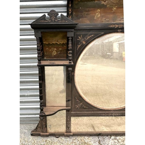 2194 - An Aesthetic Movement ebonised overmantle mirror, the panels hand painted with river scenes and eagr... 