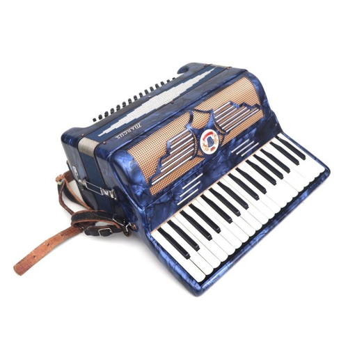 22 - A Marcus piano accordion, cased.