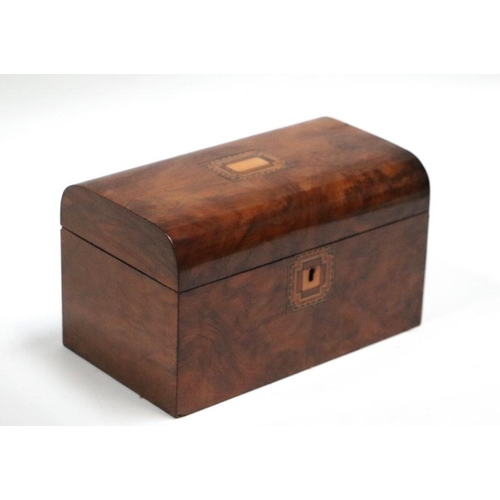 224 - A Victorian figured walnut two-division tea caddy, 26cms wide.