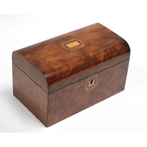 224 - A Victorian figured walnut two-division tea caddy, 26cms wide.