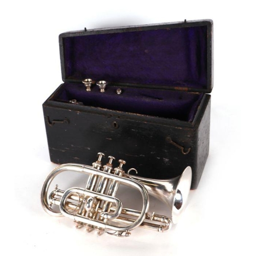 24 - A Ball Beavon & Co. silver plated cornet in original painted pine carry case.