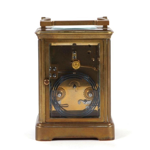 293 - A brass cased carriage clock, the silvered dial with Arabic numerals, the movement striking on a gon... 