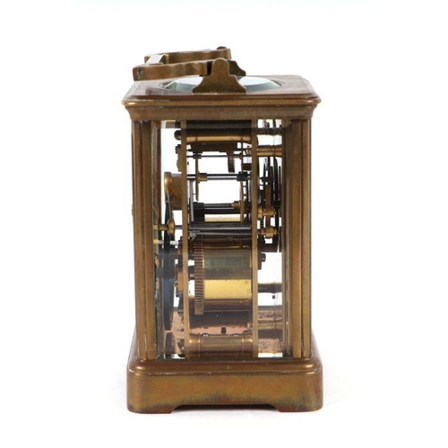 293 - A brass cased carriage clock, the silvered dial with Arabic numerals, the movement striking on a gon... 