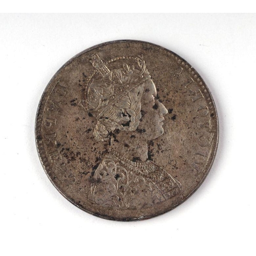 315 - A Victorian silver Gothic mis-struck error coin, double headed, created when the first coin hadn't c... 