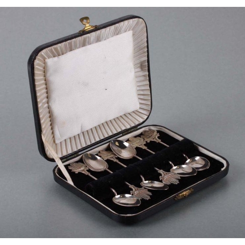 365 - A boxed set of Chinese silver teaspoons.