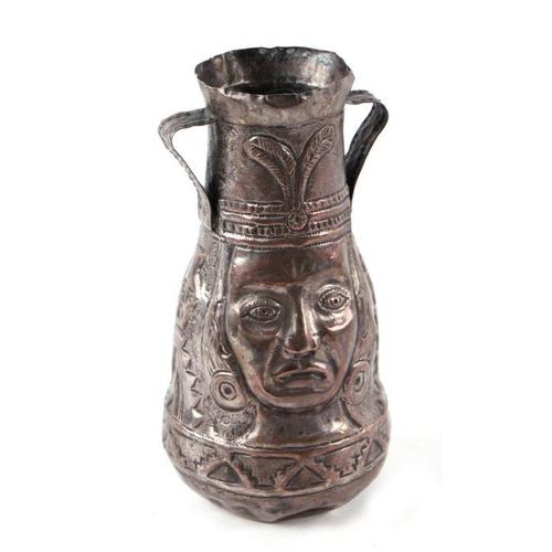 367 - A South American Aztec two-handled silver plated vase, 15.5cms high.