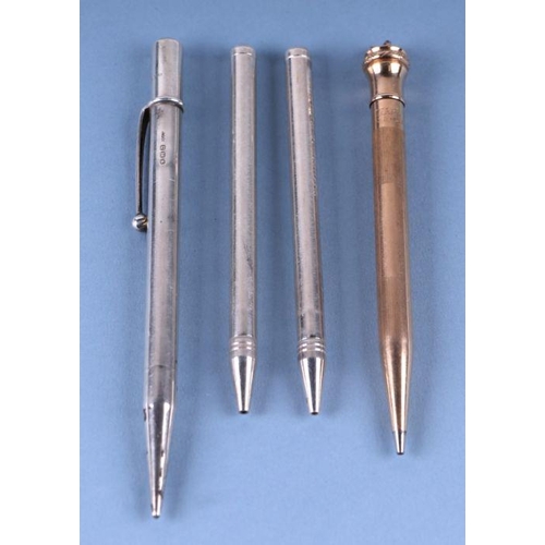 374 - A Wahl Eversharp gold plated propelling pencil; together with a silver propelling pencil; and two wh... 