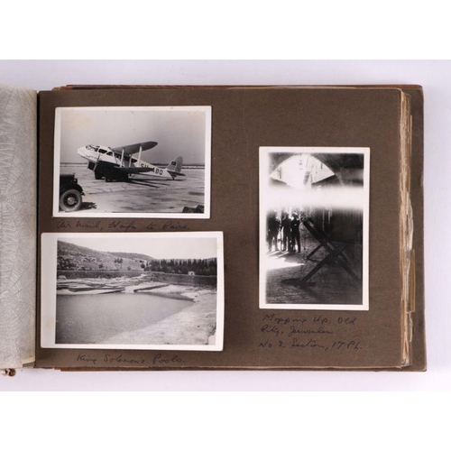 49 - A post and WWII black and white photograph album of a Middle East military tour, to include images o... 