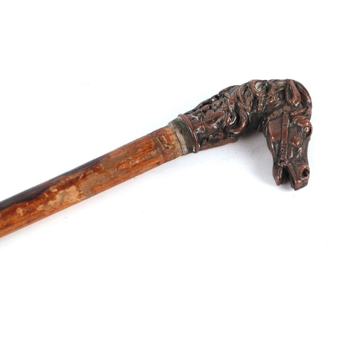 76 - An electrotype copper horse head swagger stick. Overall length 75sms (29.5ins)