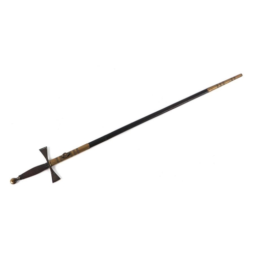 799 - A Masonic Court sword with wire grip, in a brass mounted leather scabbard, 85cms long.