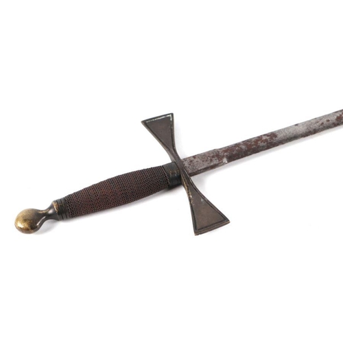 799 - A Masonic Court sword with wire grip, in a brass mounted leather scabbard, 85cms long.