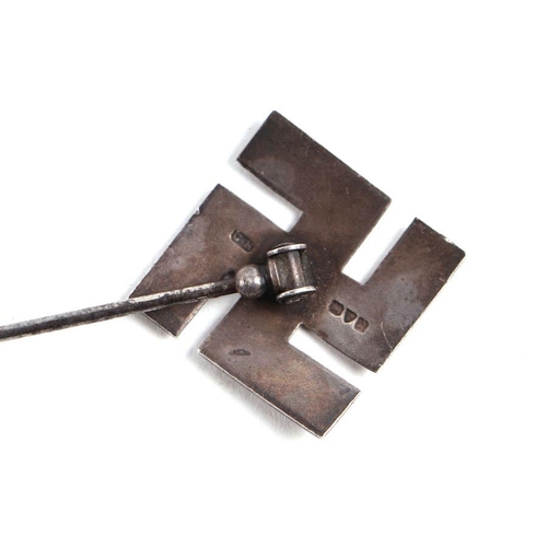 84 - A 1930's silver Nazi Swastika ladies hat pin, marks indistinct, 13cms long.