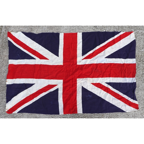 67 - Two early 20th century printed linen Union Jack flags. The largest is approximately 174cms (68.5ins)... 